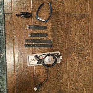 Two Fitbit + Replacement Bands + Chargers